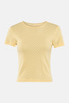 T-shirt jaune à manches courtes de ONLY, avec un motif ajouré en forme de cœur.