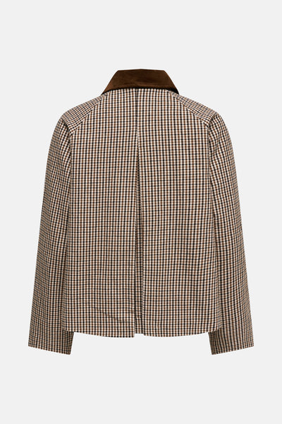 Veste courte multicolore de ONLY® avec un motif à carreaux et un col en velours marron.
