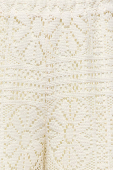 Pantalon écru de ONLY® en dentelle au crochet avec motif ajouré floral et géométrique.