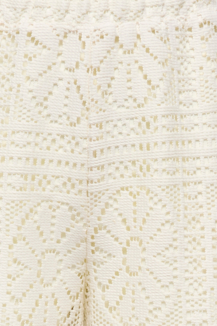 Pantalon écru de ONLY® en dentelle au crochet avec motif ajouré floral et géométrique.