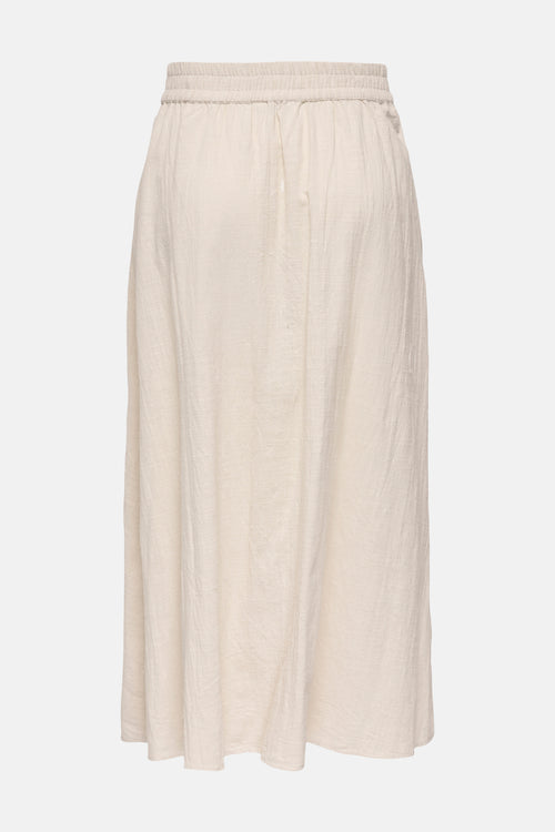 Jupe longue beige en tissu texturé de ONLY, avec taille élastique et coupe évasée.