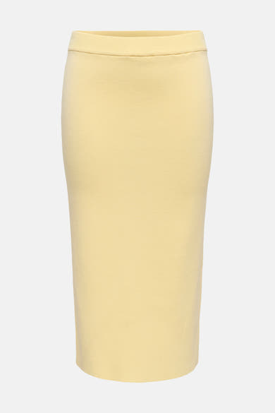 Gele 3/4 rok van JDY, met elastische tailleband en fijne ribstructuur, van achteren gezien.