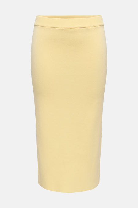 Gele 3/4 rok van JDY, met elastische tailleband en fijne ribstructuur, van achteren gezien.