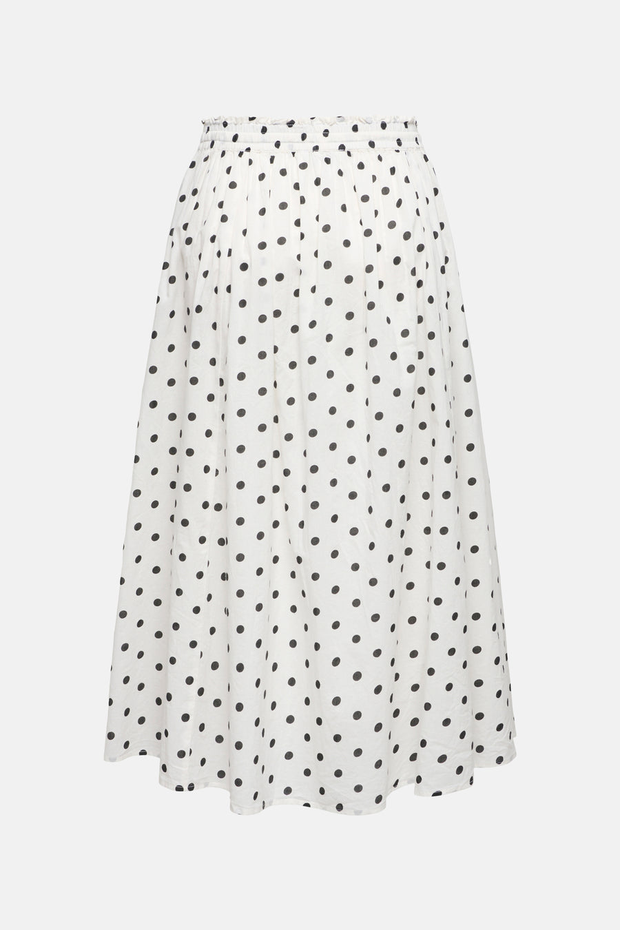 Jupe longue blanche à pois noirs de JDY, avec taille élastique et coupe évasée.