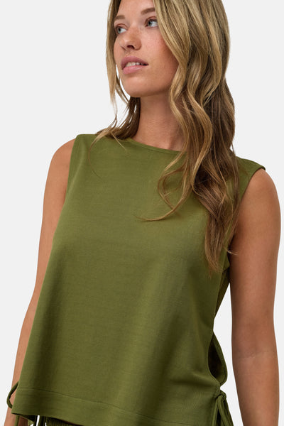 Olive green sleeveless blouse with side ties and rounded neckline, worn by model in lifestyle front view