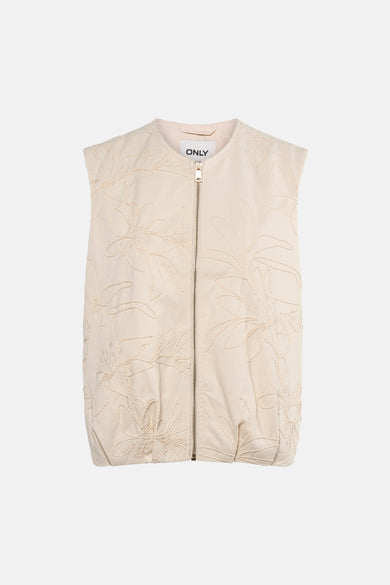 Beige mouwloos vest van ONLY met geborduurd bloemenpatroon en ritssluiting middenvoor.