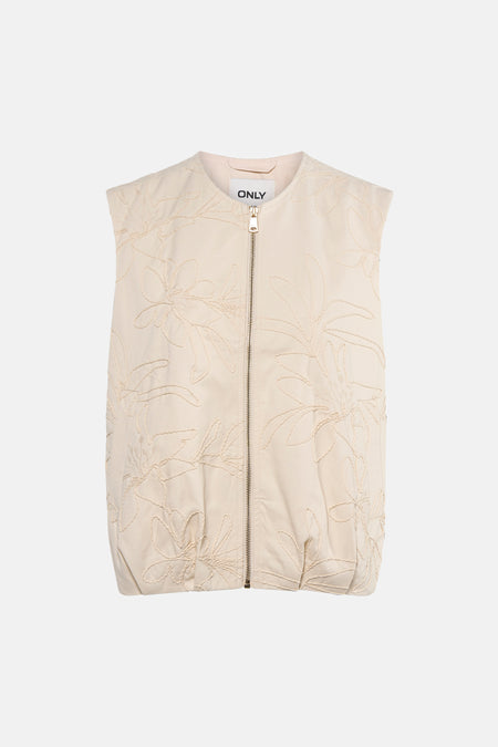 Beige mouwloos vest van ONLY met geborduurd bloemenpatroon en ritssluiting middenvoor.
