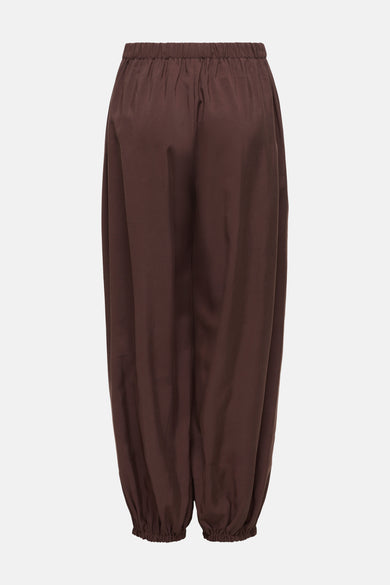 Pantalon brun ONLY® avec taille élastique et chevilles froncées.