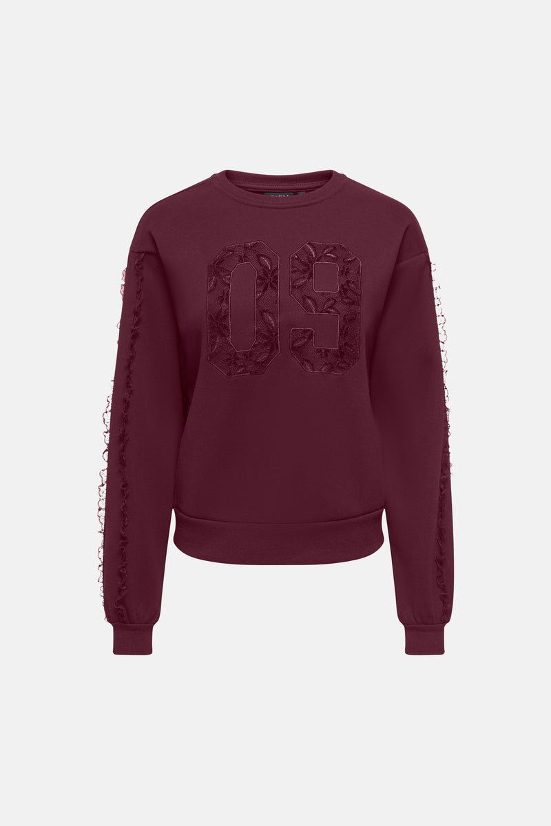 Bordeaux round-neck sweatshirt with floral embroidered "09" and lace-trimmed sleeves, front view