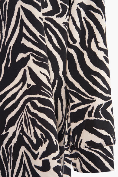 Multikleuren lange mouwen jurk van Terra di Siena, zebraprint, manchetdetail.