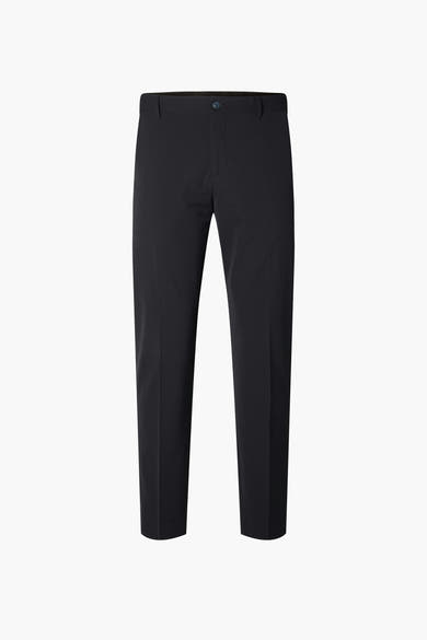 Pantalon de costume bleu de SELECTED, coupe ajustée et détails sobres.
