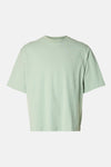 T-shirt à manches courtes vert de SELECTED, coupe décontractée sur un fond uni.
