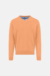 Pull à col en V orange de FYNCH-HATTON avec un petit logo brodé.