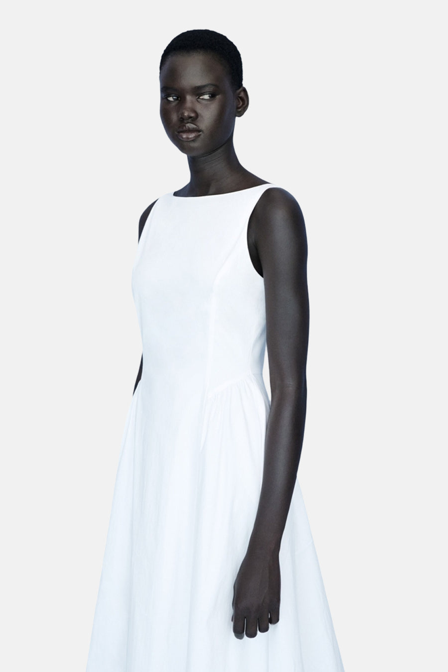Witte jurk van MANGO, effen model met een aansluitende en uitlopende pasvorm.