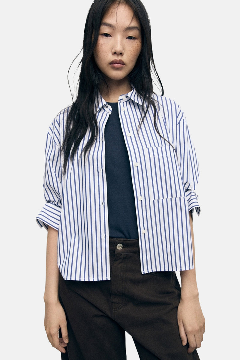 Multikleuren gestreept overhemd van MANGO met een button-down kraag en knoopsluiting.