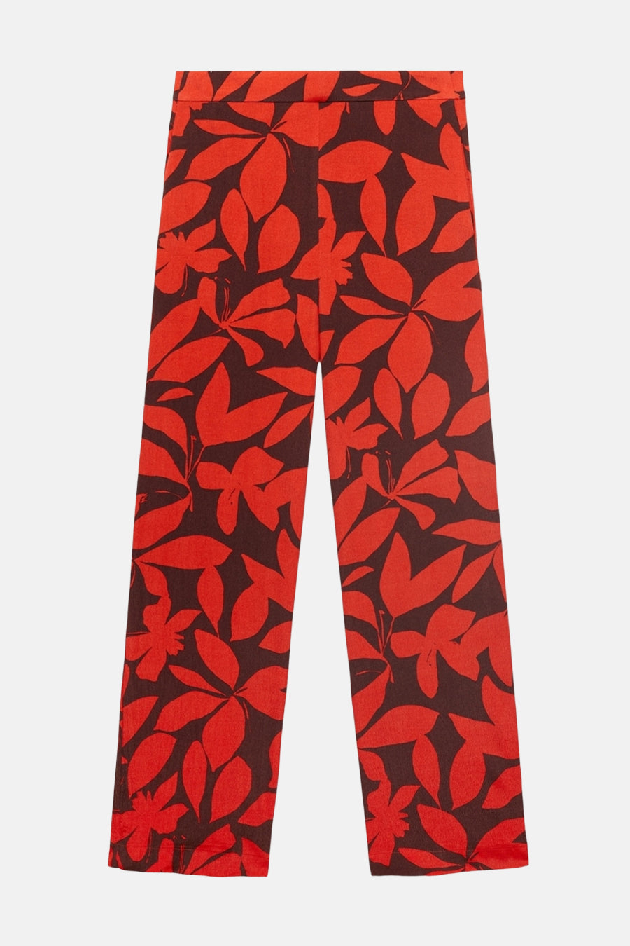 Multikleurige broek van MANGO met een rood bloemenpatroon op een donkerbruine achtergrond.
