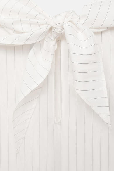 Witte blouse met lange mouwen van MANGO, verticale strepen en decoratieve strik aan de voorkant.