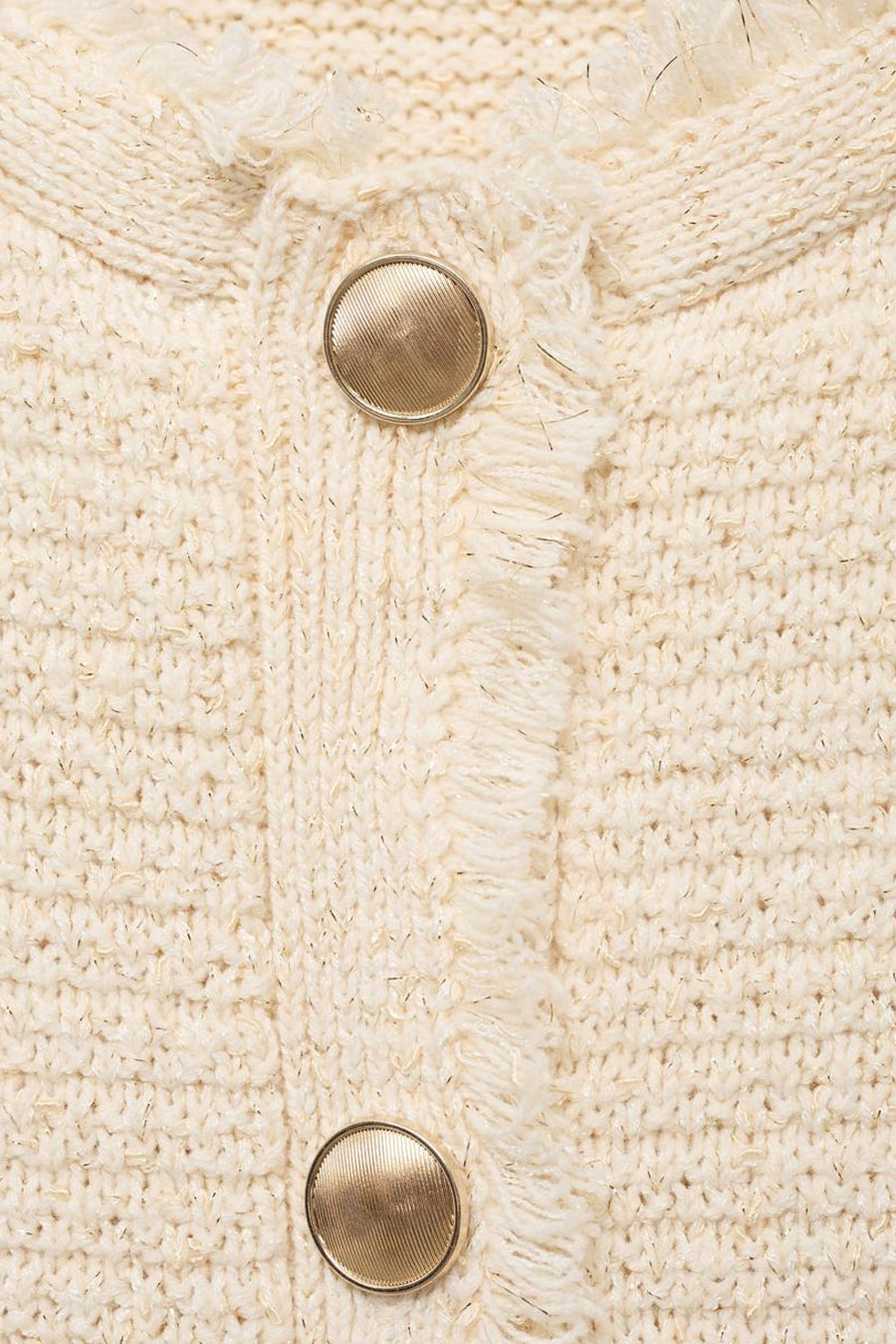 Ecru vest van MANGO met gouden knopen en getextureerde franjedetails.