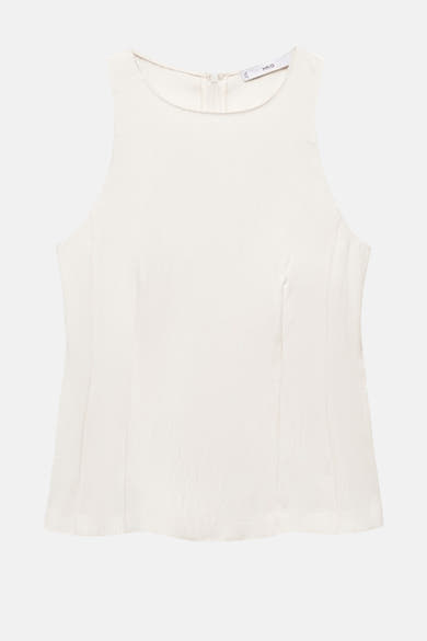Ecru mouwloos blouse van MANGO, met een discrete ritssluiting aan de achterkant en een subtiele textuur.