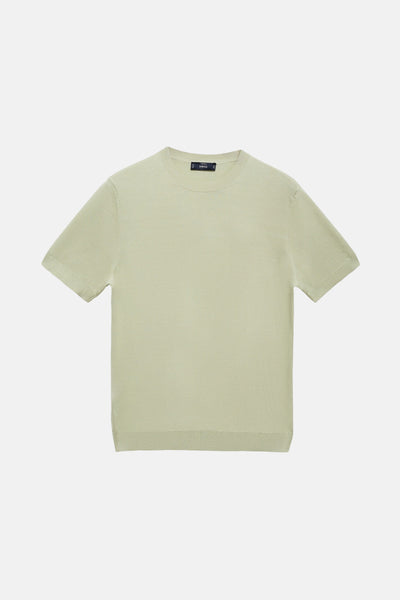 T-shirt vert à manches courtes de MANGO, en maille fine, sur fond blanc.
