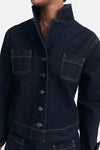 Veste en jean bleu foncé de MANGO avec poches carrées et boutons argentés.