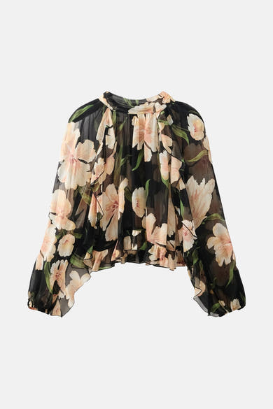 Blouse à manches longues multicolore de MANGO, à motif floral et détails à volants.