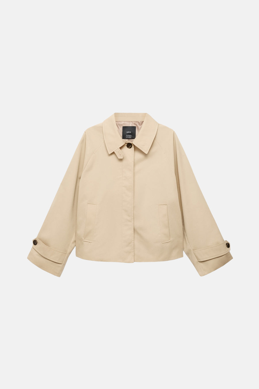 Veste courte beige de MANGO avec manches trois-quarts et poches plaquées.
