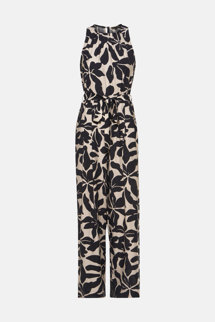 Combinaison noire à motif floral par MANGO, avec ceinture assortie nouée à la taille.