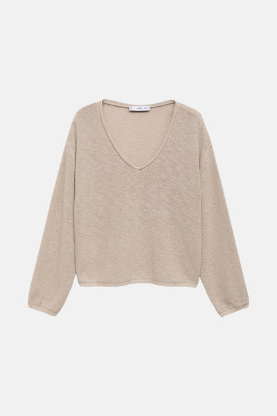 Beige V-hals trui van MANGO, met een lichte gebreide textuur en lange mouwen.