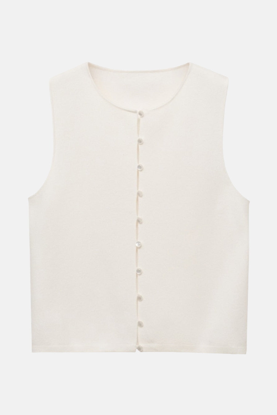 Gilet blanc de MANGO avec une rangée de boutons nacrés sur fond uni.