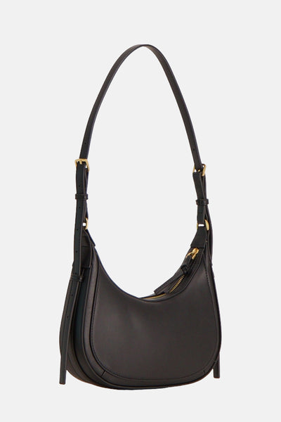 Sac à main noir en cuir, de MANGO, avec une bandoulière réglable et fermeture éclair dorée visible.