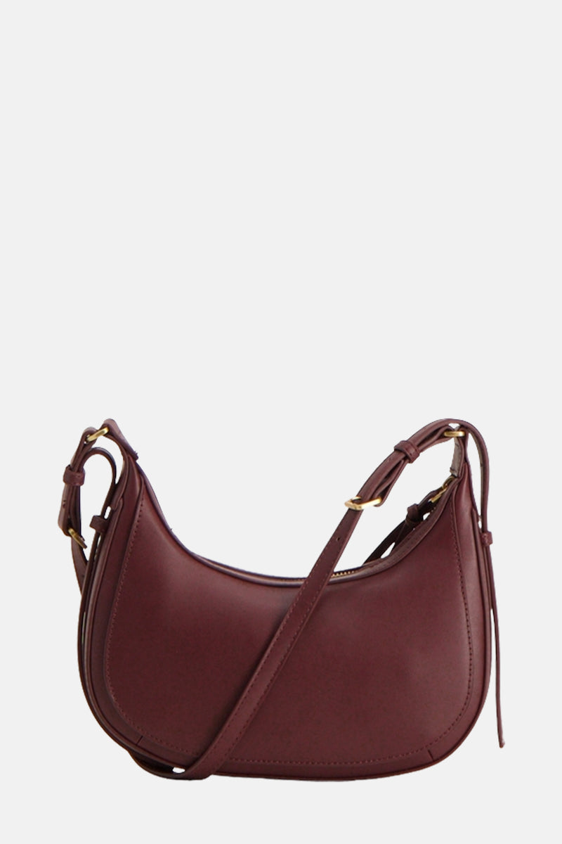 Bordeaux handtas van MANGO, met een verstelbare schouderriem en gouden metalen details.