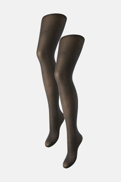 Zwarte panty's van PIECES®, licht glanzende textuur, gepresenteerd zonder model op een effen achtergrond.