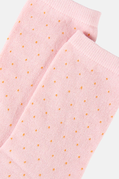 Chaussettes roses à pois dorés par PIECES®, motif régulier, texture tricotée fine.