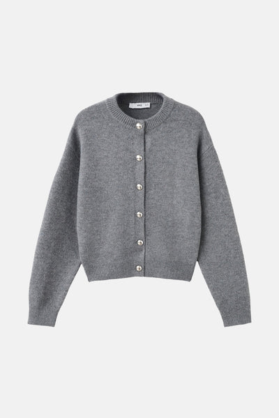 Gilet gris chiné de MANGO, avec une fermeture boutonnée argentée sur fond uni.