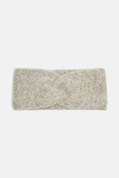 Beige oorwarmers van PIECES®, met textuurpatroon en gedraaid detail.