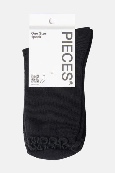 Black ankle socks with ribbed texture and braided toe detail by Pieces, shown on white tag, front view
