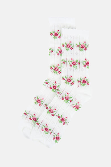 Witte fijngebreide sokken van PIECES® met een roze en groen bloemenpatroon.