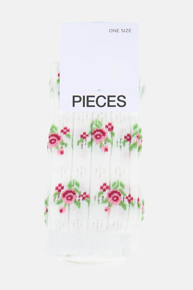Chaussettes blanches en maille fine de PIECES® avec un motif floral rose et vert.