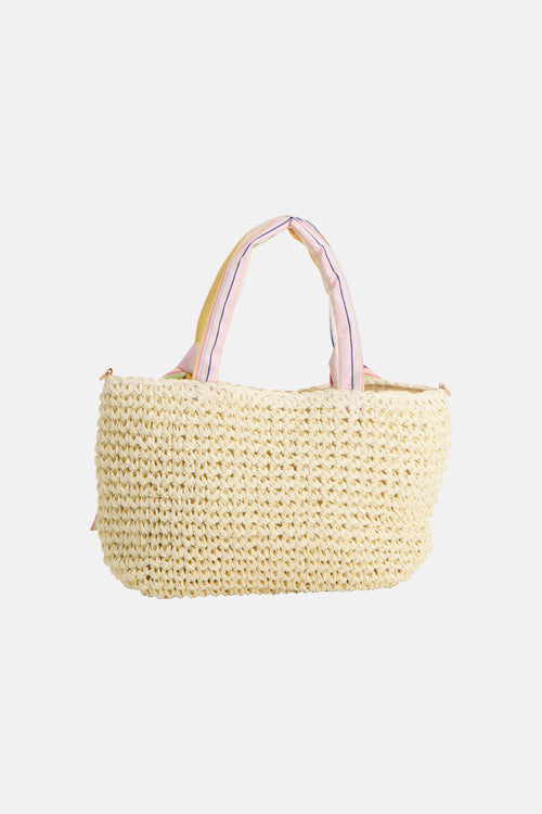 Sac à bandoulière écru en raphia tressé de PIECES® avec anses en tissu rayé multicolore.