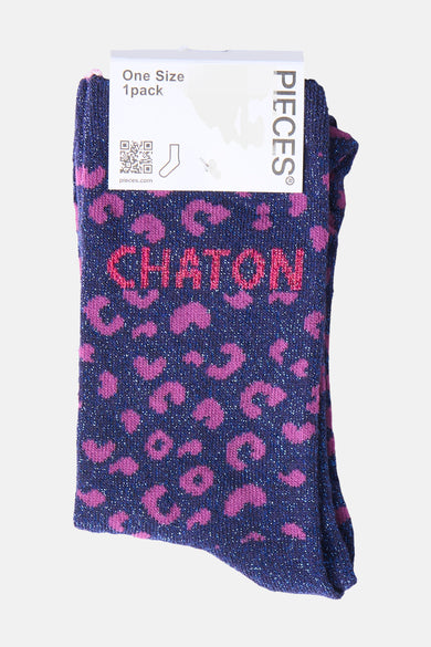 Maritime blue socks with pink leopard print and "CHATON" text by Pieces, featuring glittery texture and folded display.