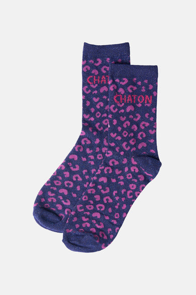 Maritime blue socks with pink leopard print and "CHATON" text, shimmering knit texture, front view