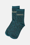 Teal ankle socks with black leopard print and gold "ELEGANTE" text, side view, textured knit fabric