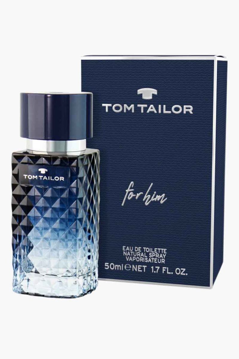 Parfum bleu géométrique de Tom Tailor, avec bouchon bleu foncé et emballage assorti.