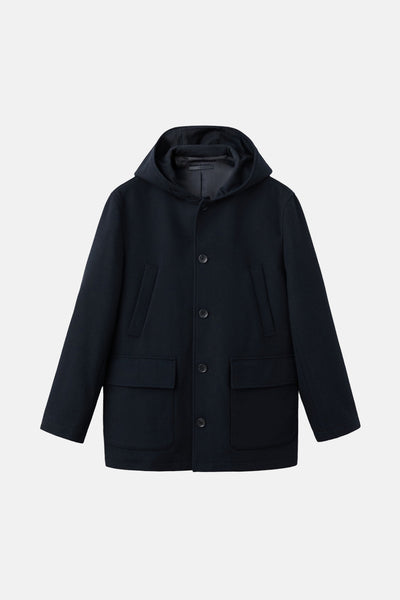 Veste courte bleu foncé de MANGO avec une capuche et des poches plaquées.