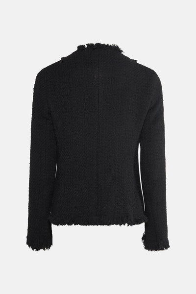 Blazer noir de MANGO, en tissu texturé avec détails effilochés sur le col et les manches.