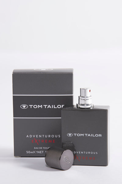 Grijze parfum voor heren van Tom Tailor, met een bijpassende doos en een metallic getextureerde dop.