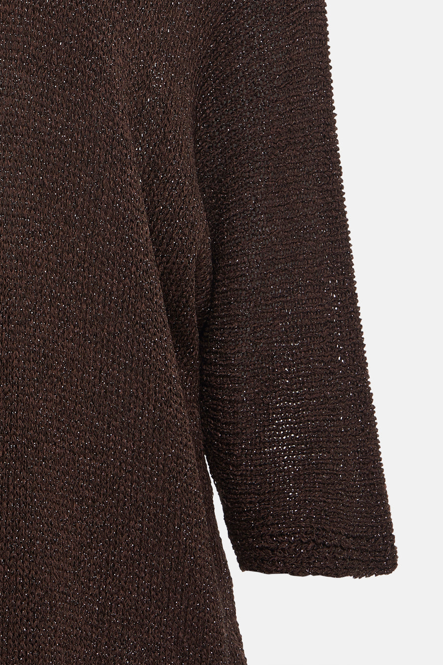 Bruin vest met ajourbreisel van Terra di Siena, met glinsterende details en een delicate textuur.