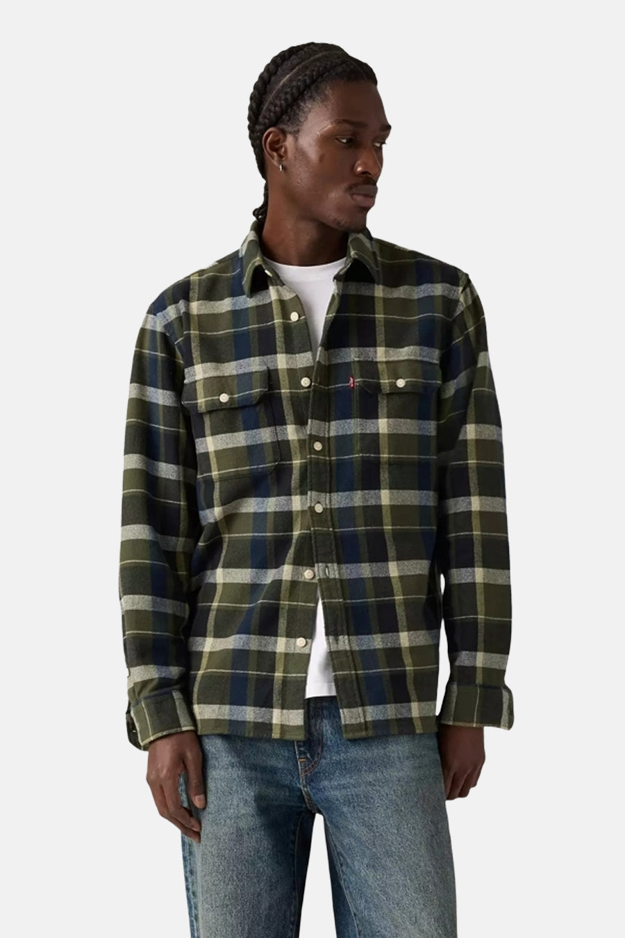 Chemise à manches longues multicolore de Levi's avec motif à carreaux et porté avec un jean.
