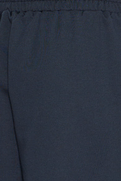 Dark blue cotton-blend pants by ICHI, featuring elastic waistband and textured knit fabric, close-up view